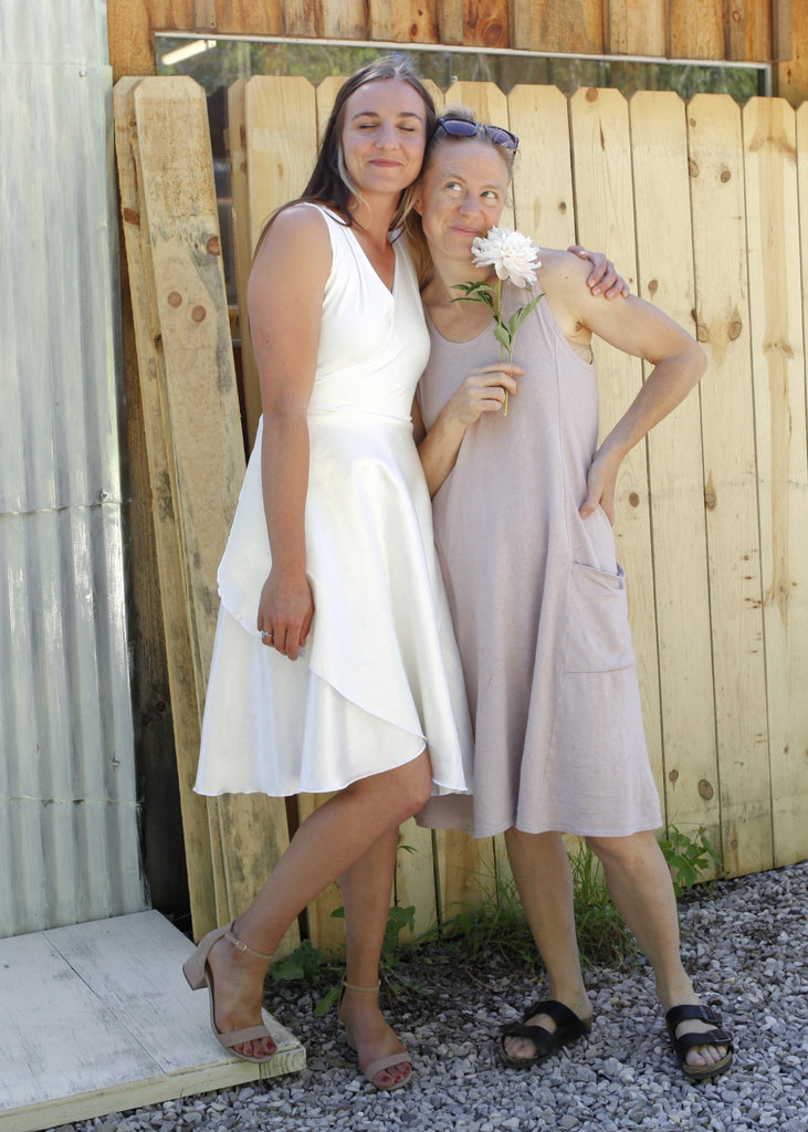 white knee length wrap dress The Solenne Linen Wrap Maxi Dress